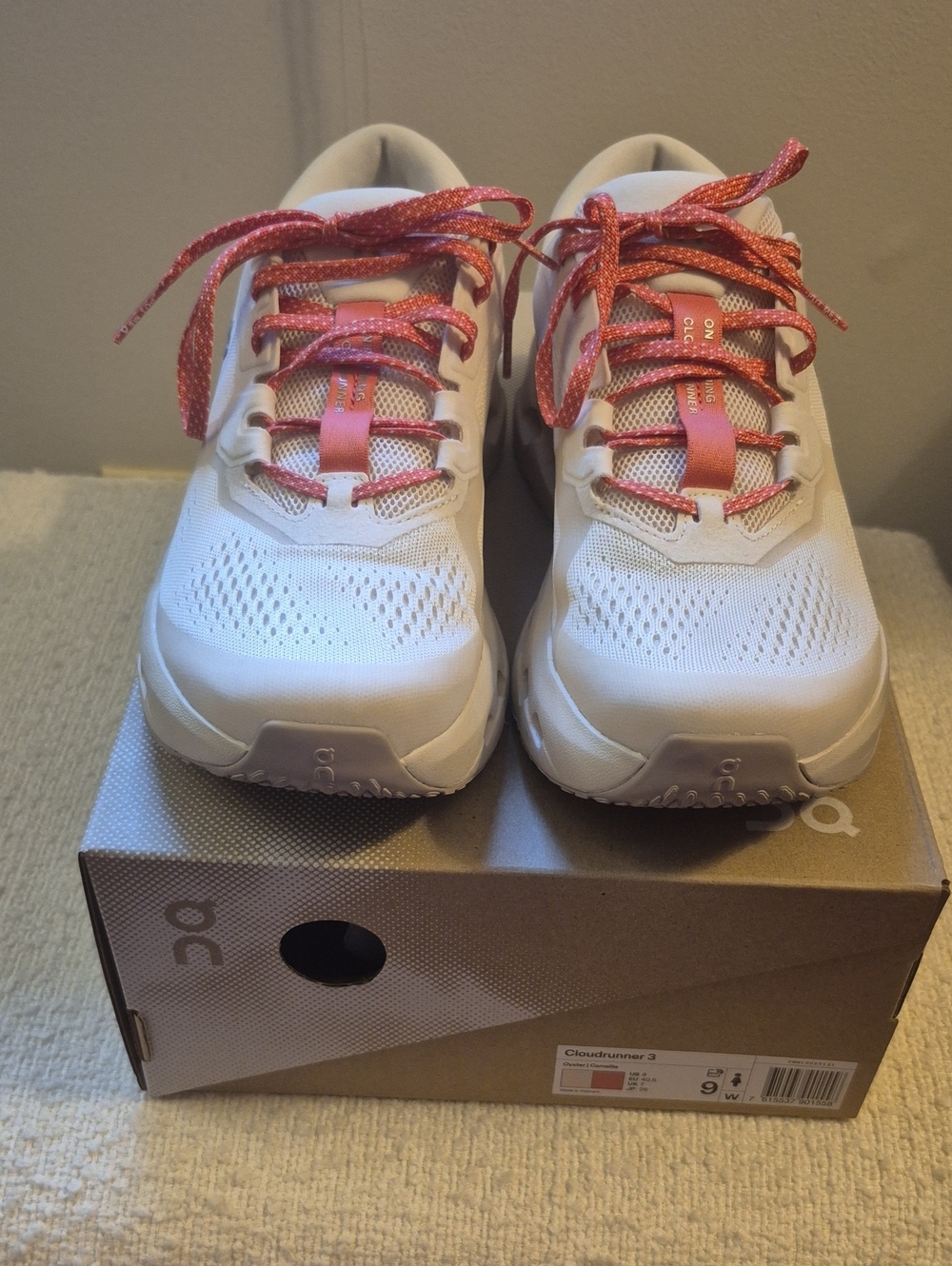 On Running Cloudrunner White Sneakers with Pink Accents